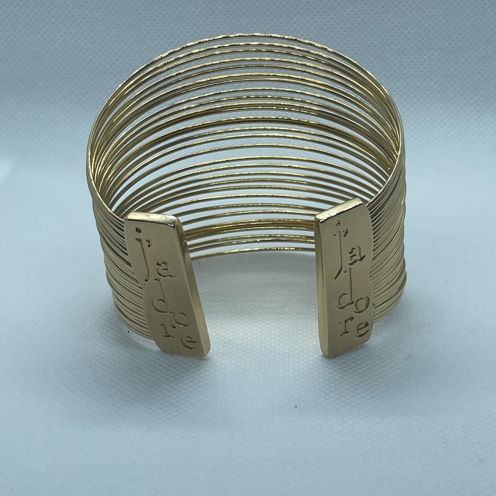 JADORE" gold toned wire choker and cuff bracelet